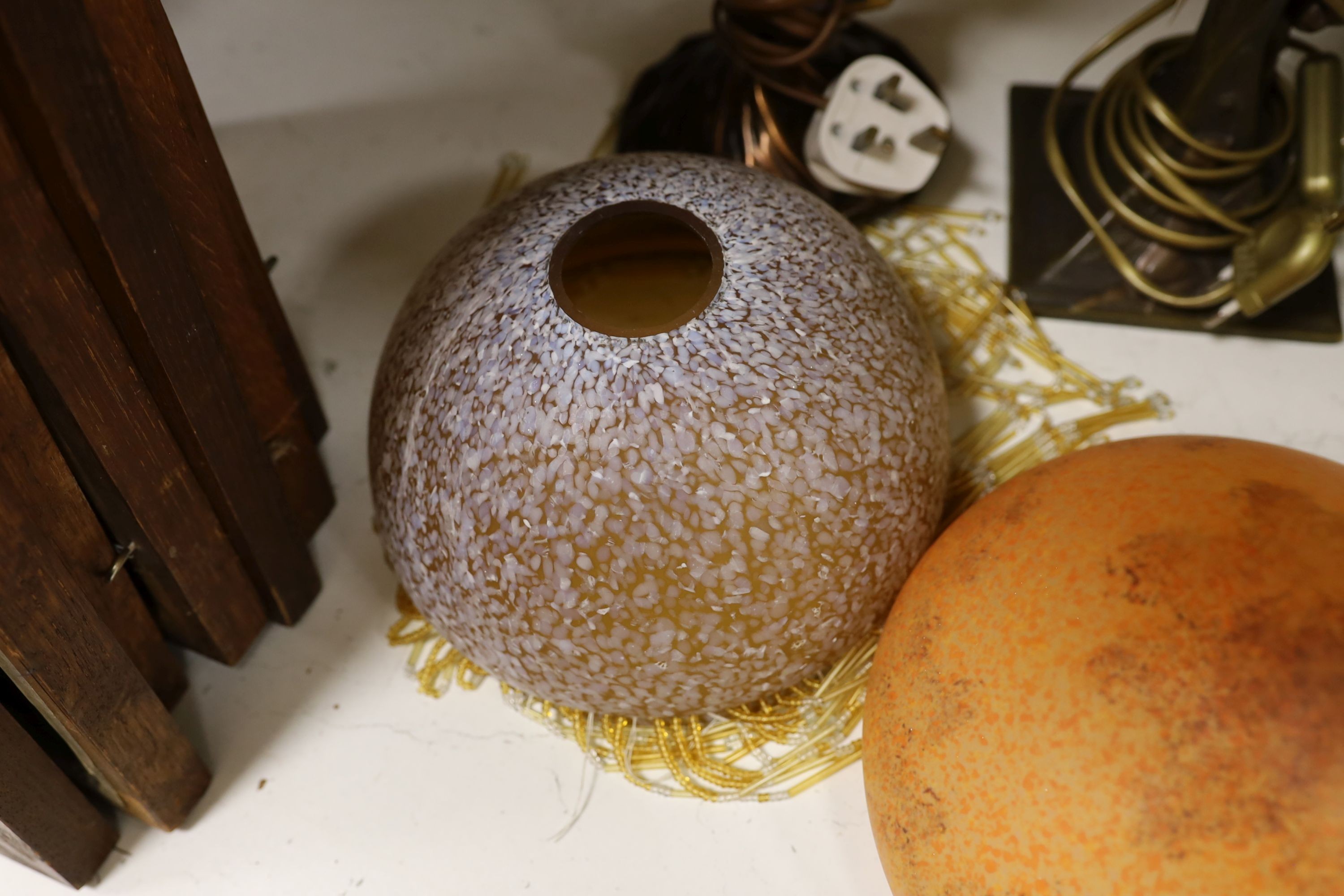 A pair of metal figural table lamps